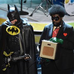 Questlove, right, performs at the Oscars on Sunday, Feb. 22, 2015, at the Dolby Theatre in Los Angeles. 