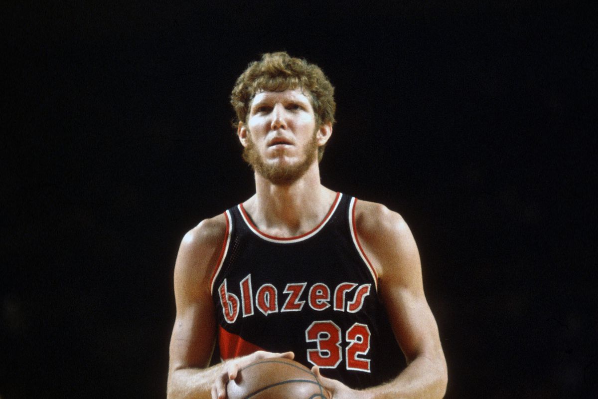 MILWAUKEE, WI - CIRCA 1977: Bill Walton #32 of the Portland Trail Blazers looks to shoot a free throw against the Milwaukee Bucks during an NBA basketball game circa 1977 at the MECCA Arena in Milwaukee, Wisconsin. Walton played for the Trailblazers from 1974 - 79. (Photo by Focus on Sport/Getty Images)