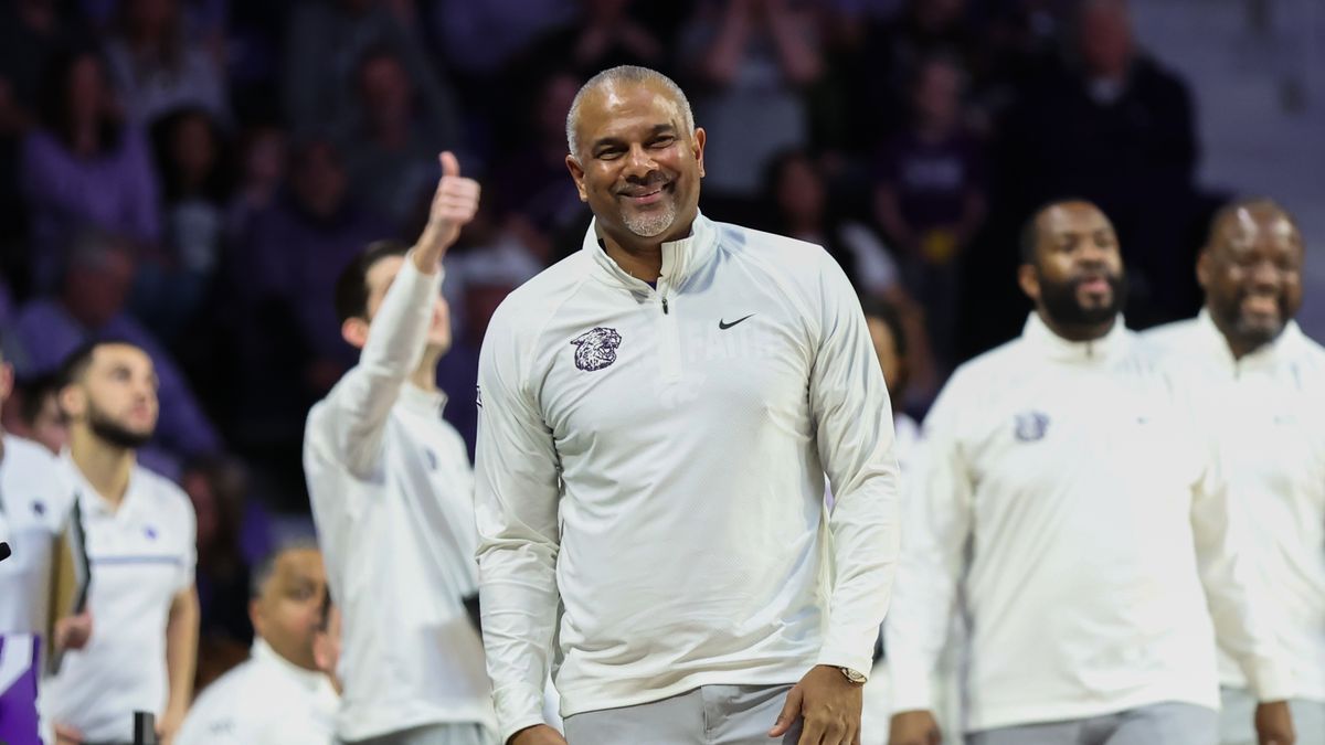 Kansas State Wildcats head coach Jerome Tang smiles in the second half of a Big 12 basketball game between the Brigham Young Cougars and Kansas State Wildcats on Feb 24, 2024 at Bramlage Coliseum in Manhattan, KS.