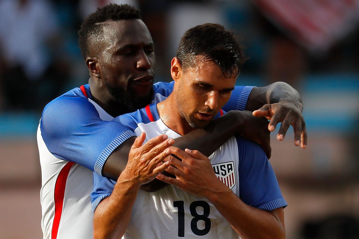 Chris Wondolowski of the United States is congratulated by Jozy Altidore after scoring the first goal against Cuba at Estadio Pedro Marrero on October 7, 2016 in Havana, Cuba.