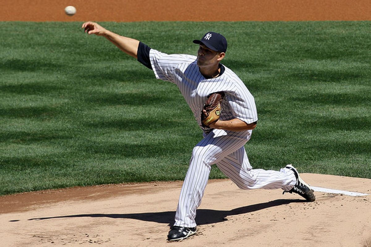 NEW YORK - APRIL 14:  Javier Vazquez #31 of the New York Yankees deals a pitch against the Los Angeles Angels of Anaheim on April 14, 2010 at Yankee Stadium in the Bronx borough of New York City.  (Photo by Jim McIsaac/Getty Images)