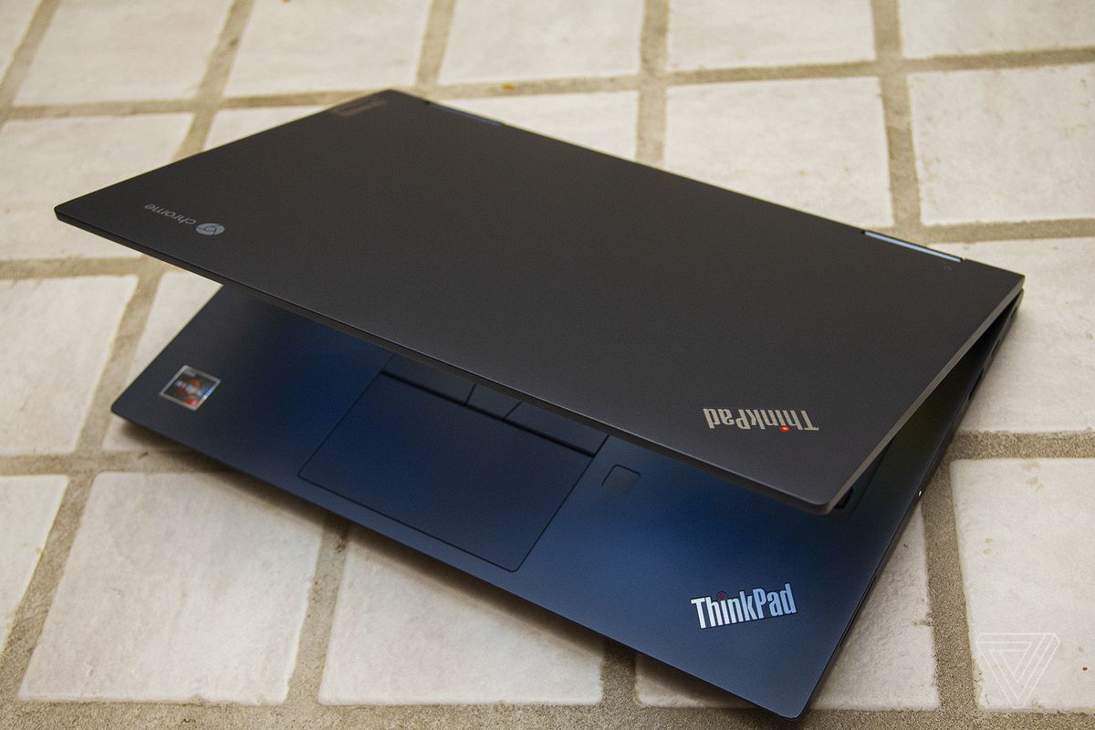 The Lenovo ThinkPad C13 Yoga Chromebook on a tile counter, seen from above, half open.