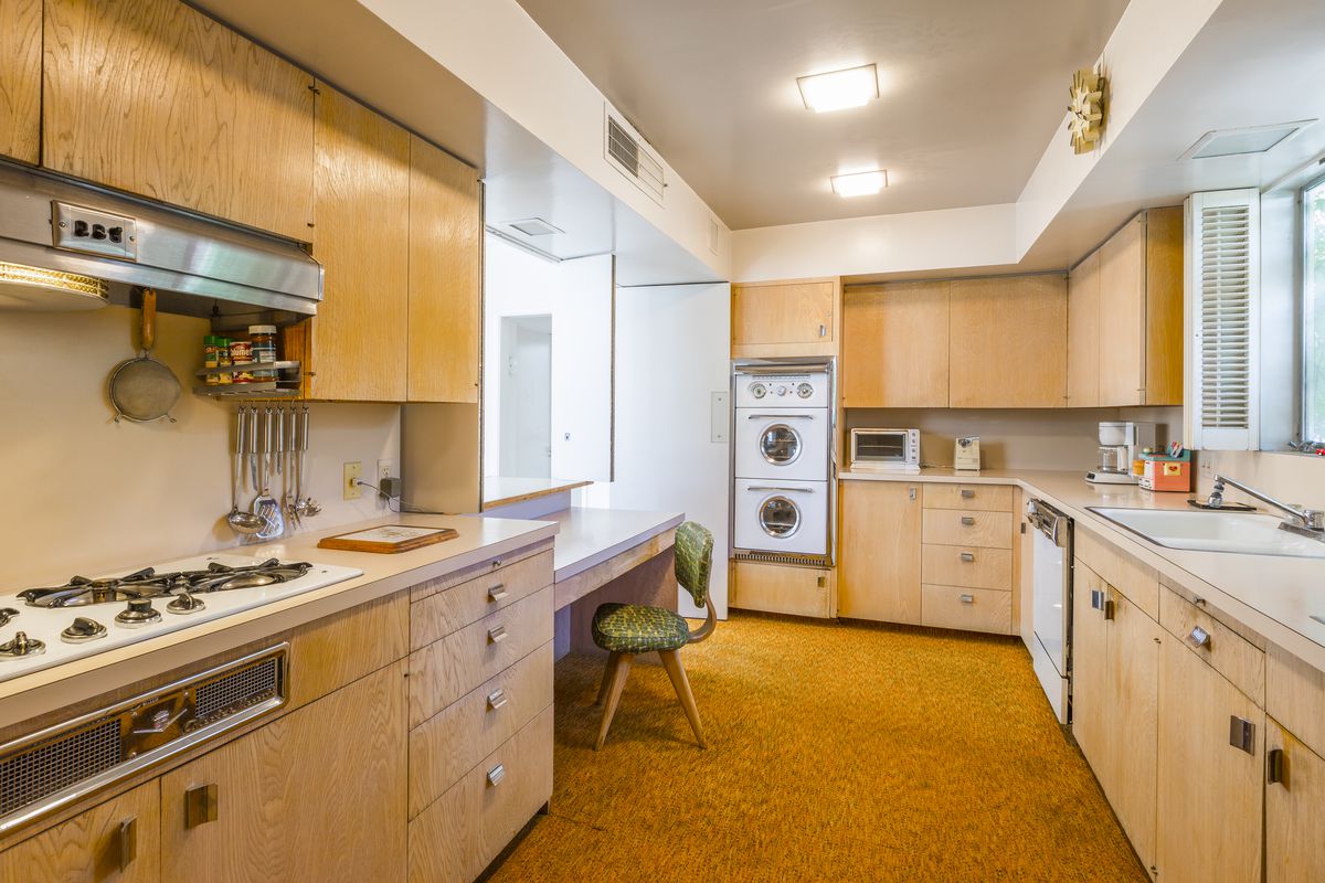 Kitchen with carpeted floor