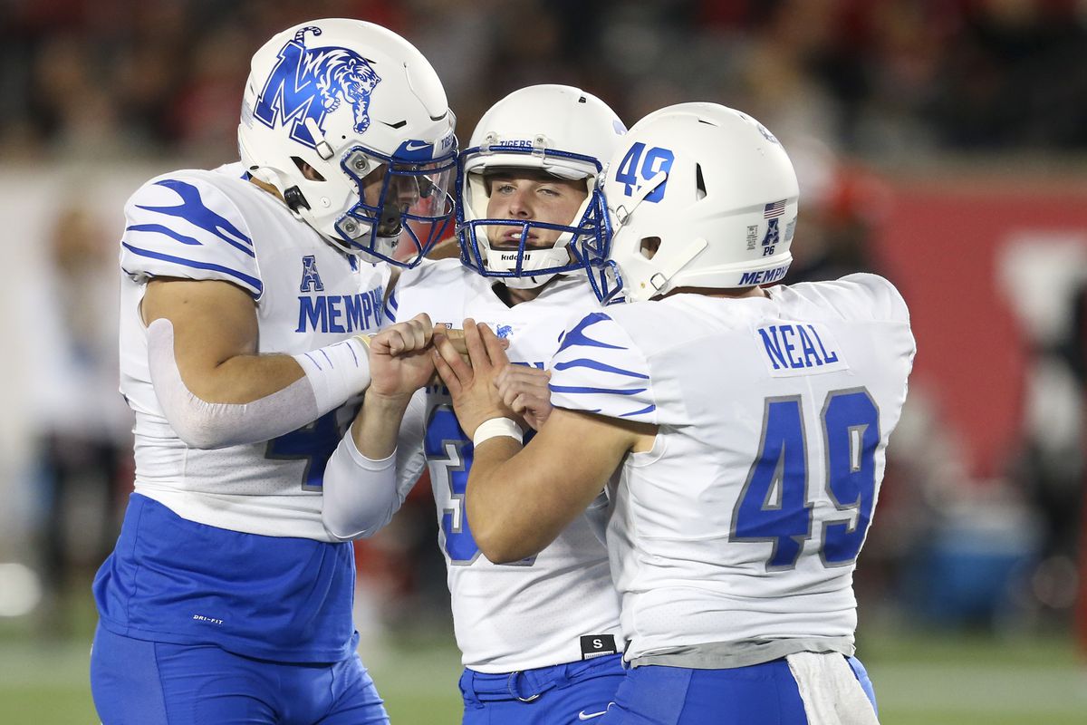 Memphis Tigers special teams player Preston Brady and long snapper Treysen Neal celebrate a 50 yard field goal by place kicker Caleb Hawkins in the second quarter against the Houston Cougars at TDECU Stadium.&nbsp;