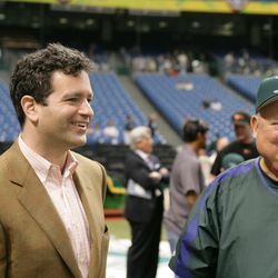 Tampa Bay Devil Rays owner Stuart Sternberg and senior baseball advisor Don Zimmer talk before the home opener against the Baltimore Orioles at Tropicana Field on April 10, 2006 in St. Petersburg, Florida. The Orioles defeated the Devil Rays 6-3.