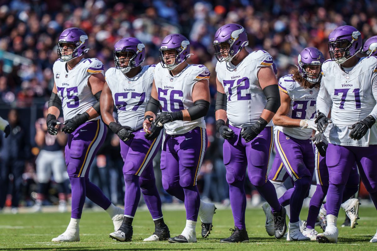 Offensive tackle Brian O’Neill #75, guard Ed Ingram #67, center Garrett Bradbury #56, guard Ezra Cleveland #72, tight end T.J. Hockenson #87, and offensive tackle Christian Darrisaw #71 of the Minnesota Vikings line up during the first half of an NFL football game against the Chicago Bears at Soldier Field on October 15, 2023 in Chicago, Illinois.