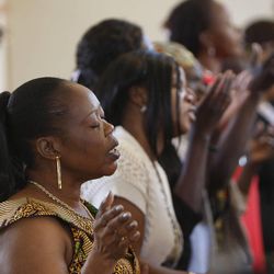 Choir sings as several hundred Sudanese, many of them "Lost Boys and Girls of Sudan," celebrate Easter with drums, dancing, food, and worship at All Saints Episcopal Church on Easter Sunday, March 31, 2013, in Salt Lake City.