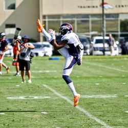 Broncos P Marquette King gets full extension on this kick during special teams drills. 