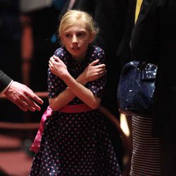 A girl waits to leave the afternoon session of the 183rd Annual General Conference of The Church of Jesus Christ of Latter-day Saints in the Conference Center in Salt Lake City on Sunday, April 7, 2013. 