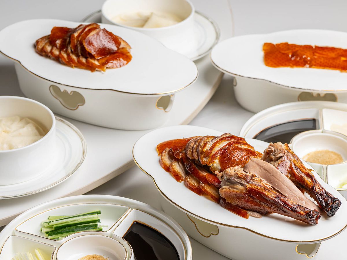 Duck served three ways with classic accompaniments.