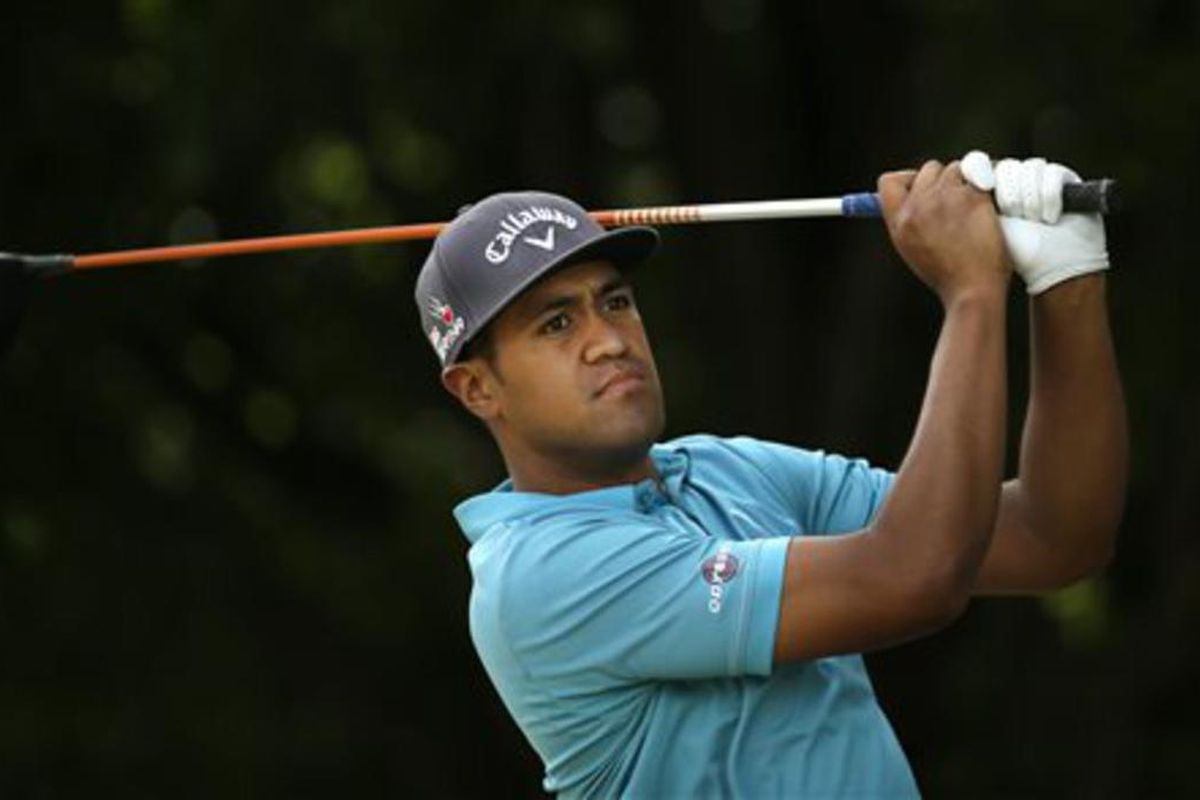 Tony Finau watches his tee shot on the first hole during the third round of the Byron Nelson golf tournament, Saturday, May 30, 2015, in Irving, Texas. (AP Photo/LM Otero)  