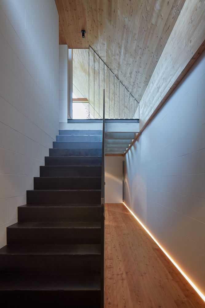 Staircase leading up to a bright area. 