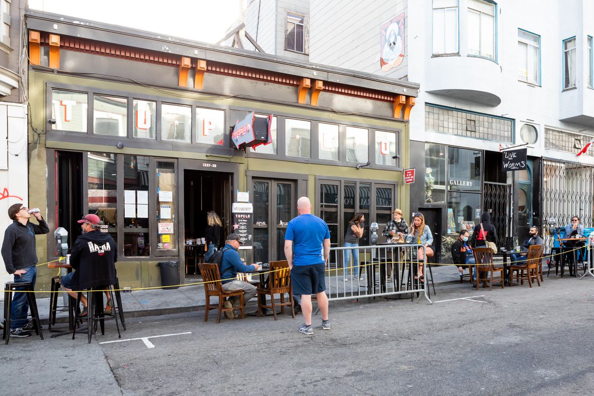 The outdoor seating at Tupelo’s is on the street, in metered parking spaces