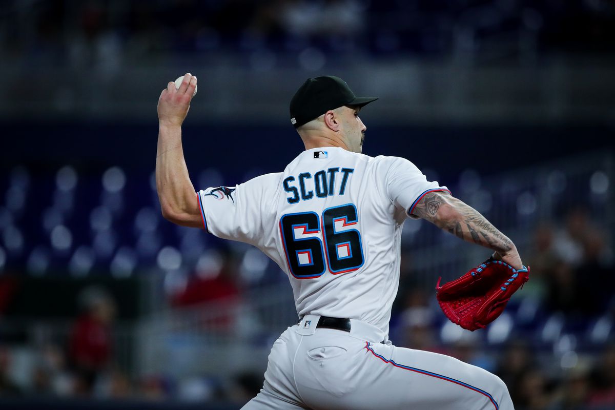 Tanner Scott #66 of the Miami Marlins pitches in the ninth inning during the game between the Washington Nationals and the Miami Marlins at loanDepot park on Thursday, June 9, 2022 in Miami, Florida.