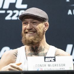 Conor McGregor laughs at UFC 229 press conference.