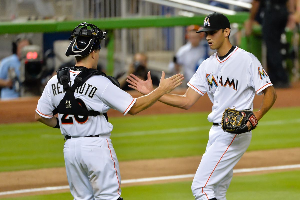 Cishek celebrates with Realmuto after sealing the win