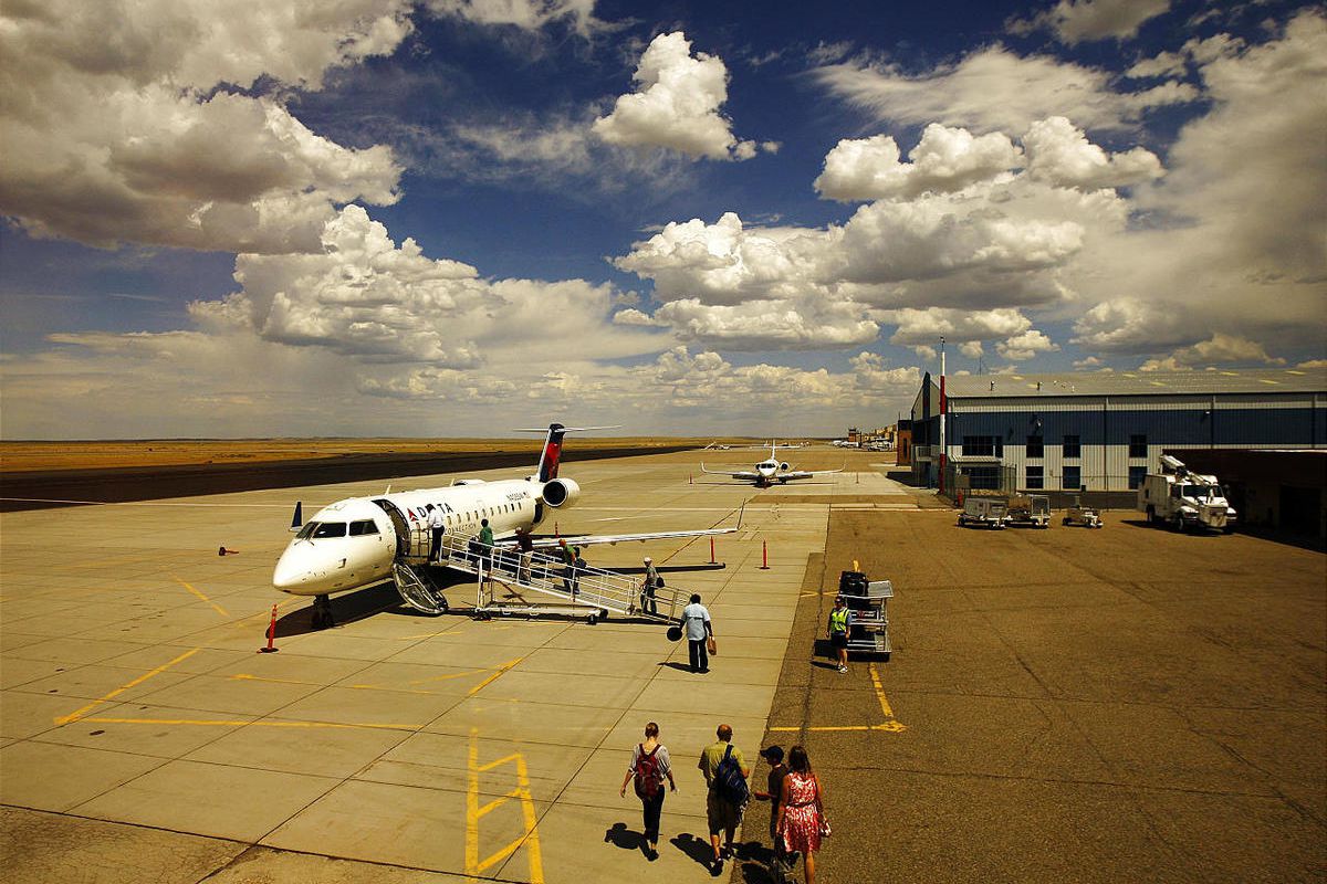 Passengers walk to board a Delta flight on Friday afternoon at the Natrona County International Airport near Casper. The airline has upgraded its planes flying to Salt Lake City.