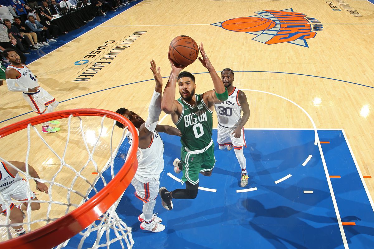 Jayson Tatum #0 of the Boston Celtics drives to the basket against the New York Knicks on October 20, 2021.