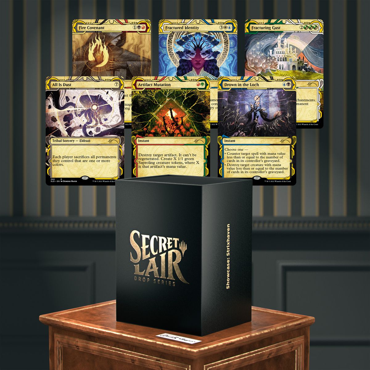 All six Strixhaven cards shown on a parlor wall, with a gilded Secret Lair box shown below.