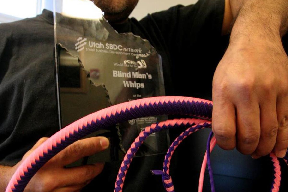 Jeremiah S. Espinoza received the 2012 Client of the Year award from the Utah Small Business Development Center in Vernal for his business, The Blind Man's Whips. Espinoza, who has Leber's optic neuropathy that has rendered him blind, makes whips, riding 