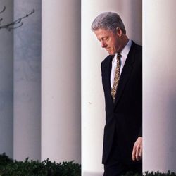 President Clinton walks to the podium to deliver a short statement on the impeachment inquiry in the Rose Garden of the White House in Washington Friday, Dec. 11, 1998. Nearing a showdown over the fate of his presidency, President Clinton apologized to the country today for his conduct in the Monica Lewinsky affair and said he would accept a congressional censure or rebuke.