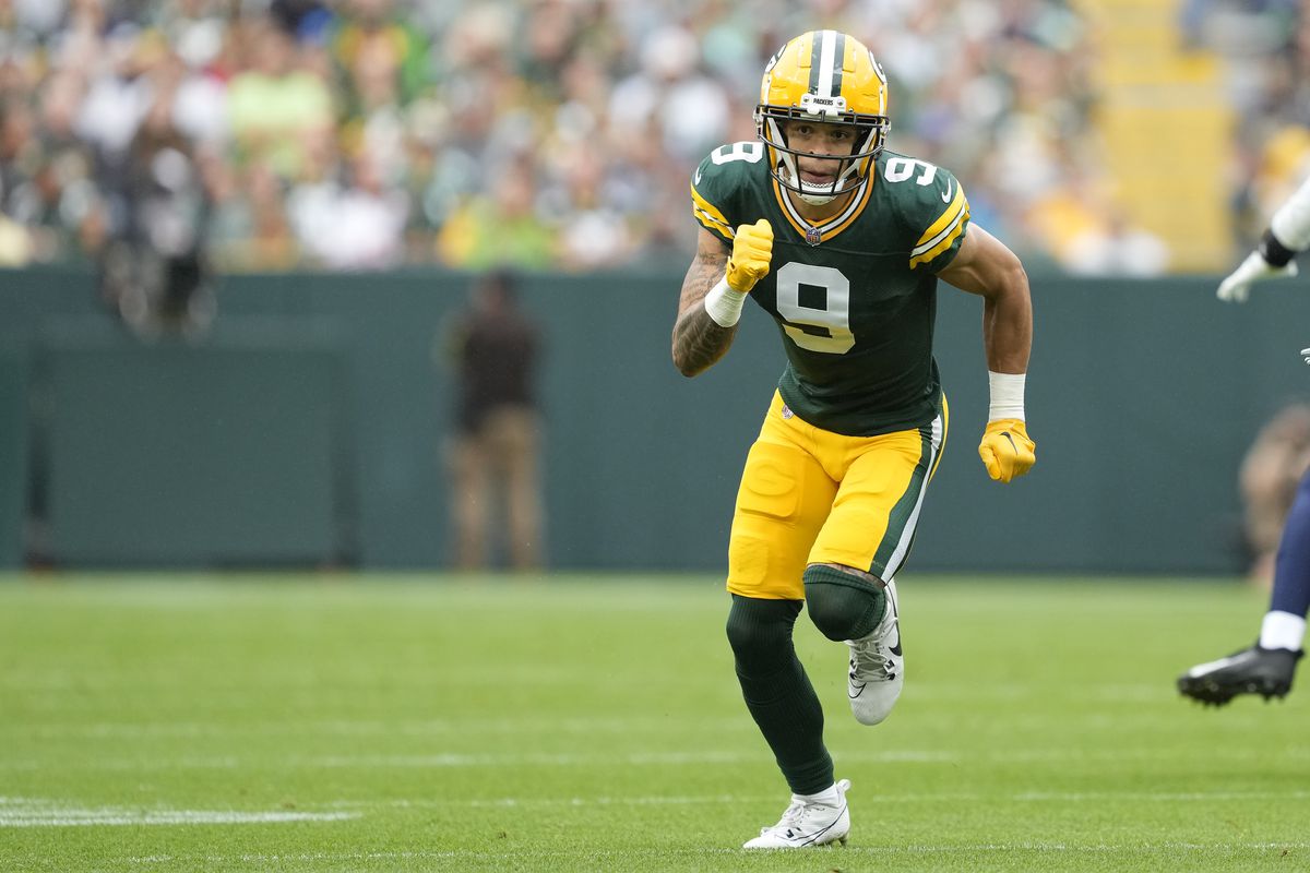 Christian Watson #9 of the Green Bay Packers runs a route in the first half against the Seattle Seahawks during a preseason game at Lambeau Field on August 26, 2023 in Green Bay, Wisconsin.