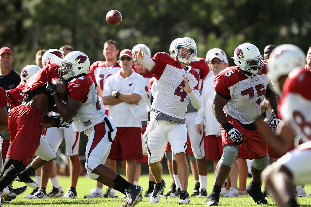 FLAGSTAFF, AZ - AUGUST 04:  Quarterback Kevin Kolb #4 of the Arizona Cardinals throws a pass during the team training camp at Northern Arizona University on August 4, 2011 in Flagstaff, Arizona.  (Photo by Christian Petersen/Getty Images)
