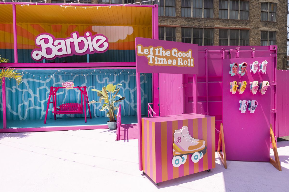 A section of an outdoor patio decorated with Barbie displays.