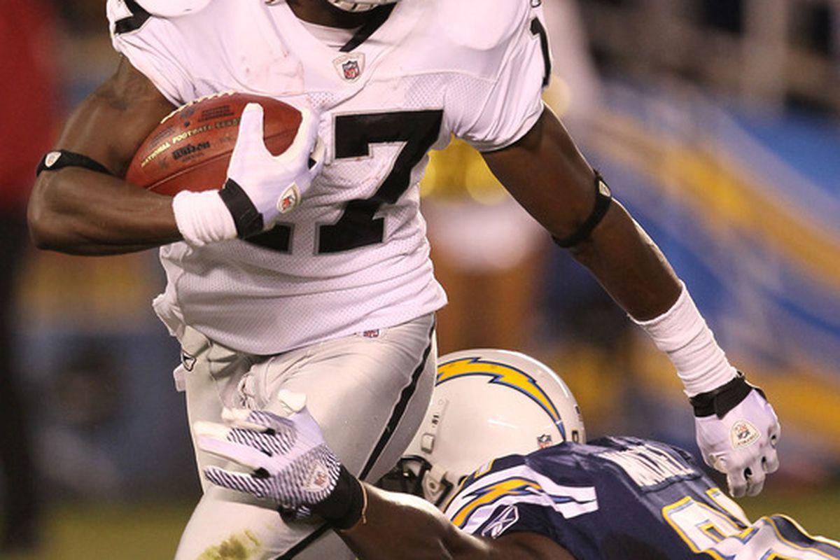 Wide receiver Denarius Moore #17 of the Oakland Raiders carries the ball against the San Diego Chargers at Qualcomm Stadium 