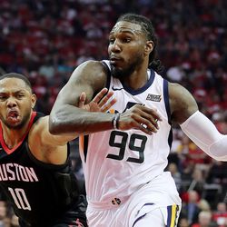 Utah Jazz forward Jae Crowder (99) drives to the hoop with Houston Rockets guard Eric Gordon (10) defending as the Utah Jazz and the Houston Rockets play game two of the NBA playoffs at the Toyota Center in Houston on Wednesday, May 2, 2018.