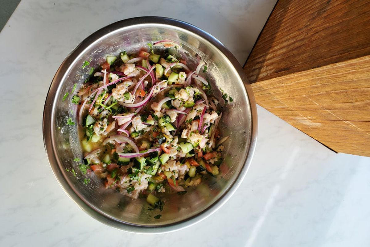 A metal bowl of Mexican ceviche.