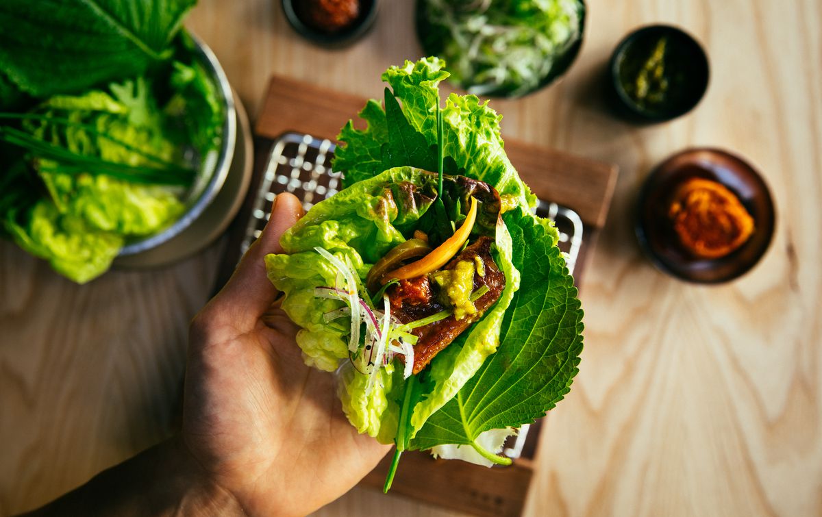 Korean barbecue in a lettuce leaf at San Ho Won