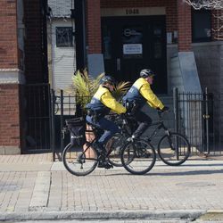 5:02 p.m. Chicago police bicycle patrol on Waveland - 