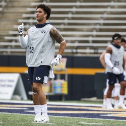 Brigham Young Cougars linebacker Jackson Kaufusi (38) dances to the stadium music during warm-ups before the start of an NCAA football game at The Glass Bowl in Toledo, Ohio on Saturday, Sept. 28, 2019.
