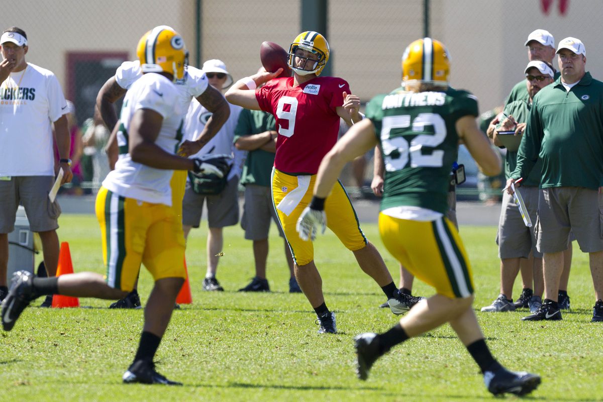 July 28, 2012; Green Bay, WI, USA; Green Bay Packers quarterback B.J. Coleman (9) throws a pass during training camp practice at Ray Nitschke Field. Mandatory Credit: Jeff Hanisch-US PRESSWIRE