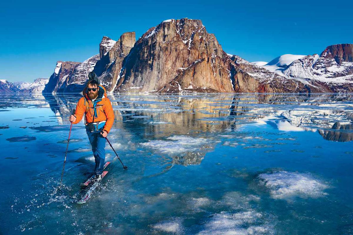 A person cross-country skiing over water