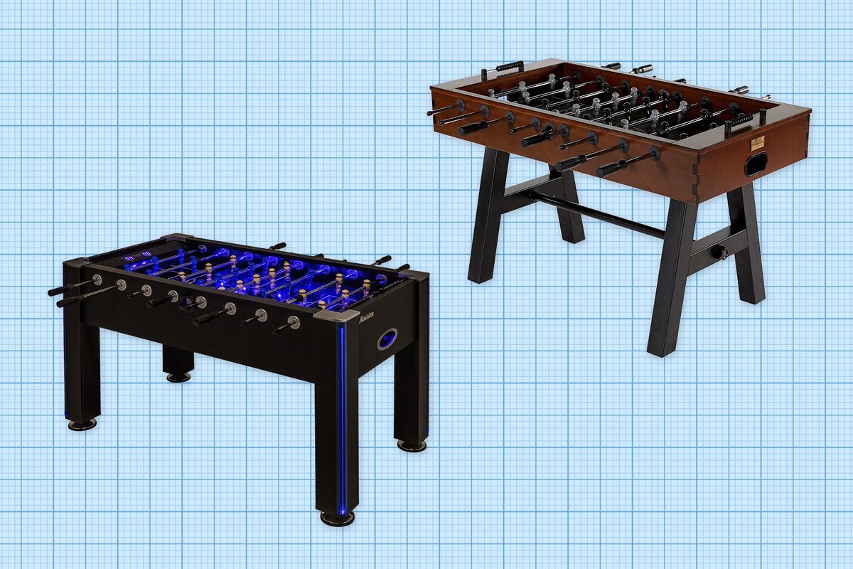 Barrington Billiards Foosball Table and Atomic Azure Light-Up Foosball Table isolated on a blue grid paper background
