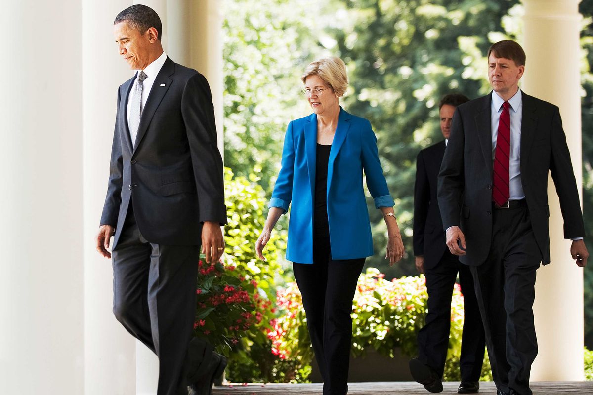 President Barack Obama walking to the White House Rose Garden followed by Elizabeth Warren and Richard Cordray in 2011.