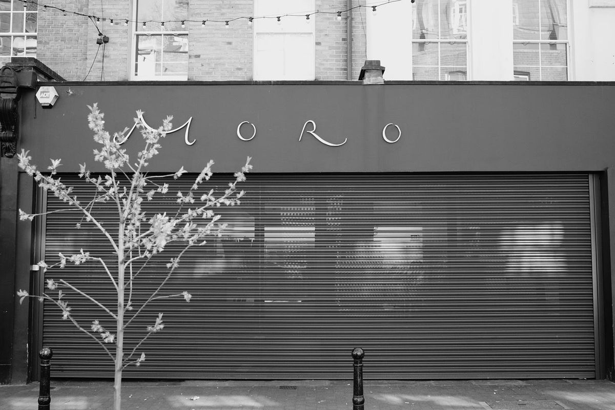 Moro, one of London’s best restaurants, with its shutters down during COVID-19; the image is in black and white