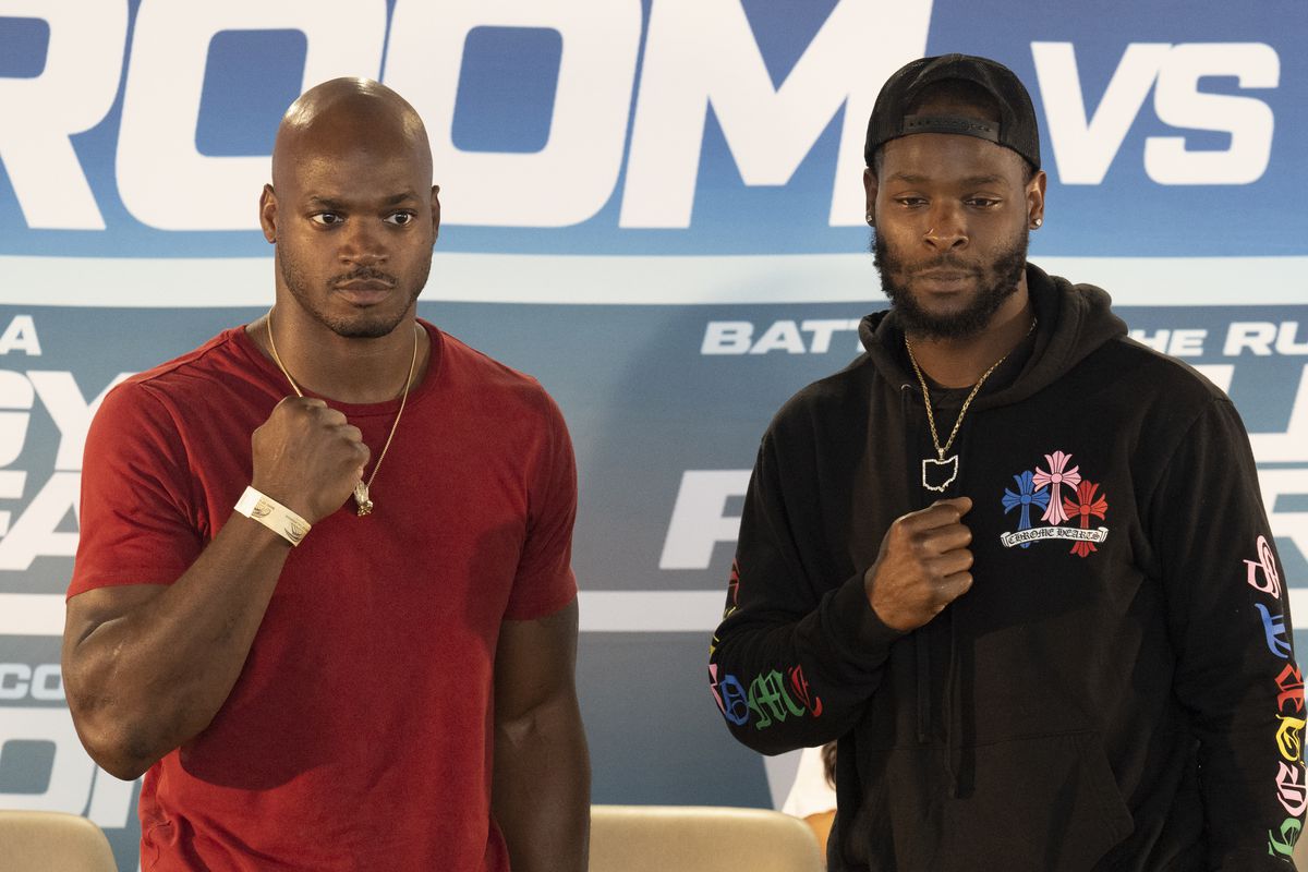 Former NFL players Adrian Peterson (L) and LeVeon Bell talk about their upcoming fight at the Banc of California Stadium on September 8, 2022 in Los Angeles, California.