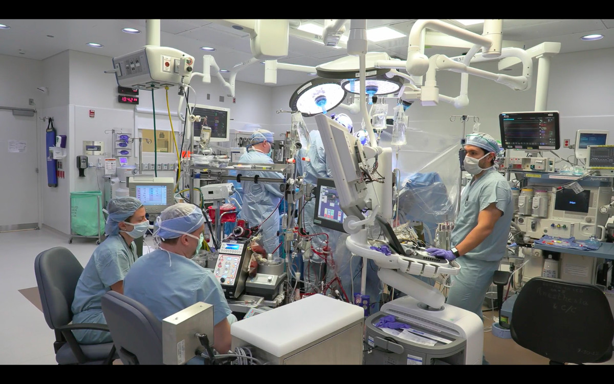 Health care workers perform a heart transplant Thursday at the University of Chicago Medical Center.