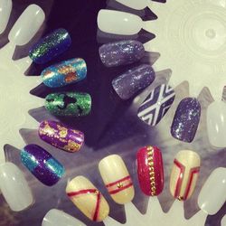 Celeb manicurist Christina Aviles and Red Carpet Manicure dreamed up these metallic nail art designs. Let's play a game of match the mani with the movie, shall we?