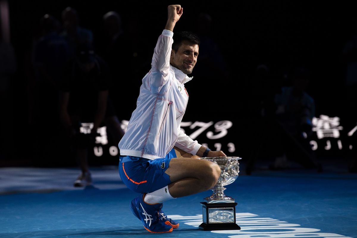 Novak Djokovic of Serbia poses with the Norman Brookes Challenge Cup after winning the Men’s Singles Final match against Stefanos Tsitsipas of Greece during day 14 of the 2023 Australian Open at Melbourne Park on January 29, 2023 in Melbourne, Australia.