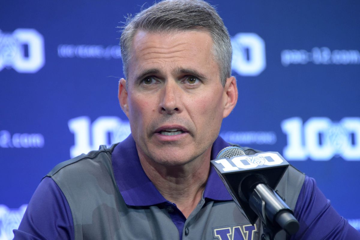 Chris Petersen leads Washington into its season opener at Boise State, his former school.