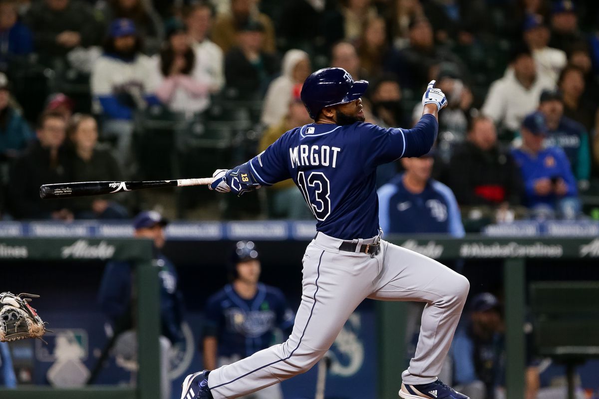Tampa Bay Rays right fielder Manuel Margot follows through on a three-run home run during the ninth inning against the Seattle Mariners at T-Mobile Park