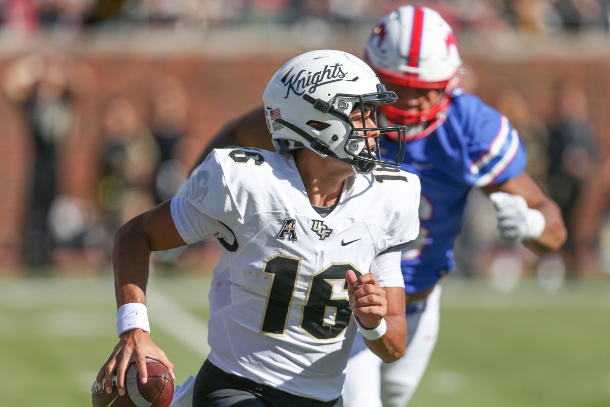 UCF Knights quarterback Mikey Keene (16) scrambles during the game between SMU and UCF on November 13, 2021 at Gerald J. Ford Stadium in Dallas, TX.
