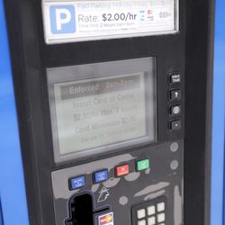 A parking kiosk in downtown Salt Lake City is pictured on Tuesday, June 11, 2019. Salt Lake City Mayor Jackie Biskupski is recommending that newly available funds be used to reduce a proposed parking meter rate increase from 50 cents 25 cents.