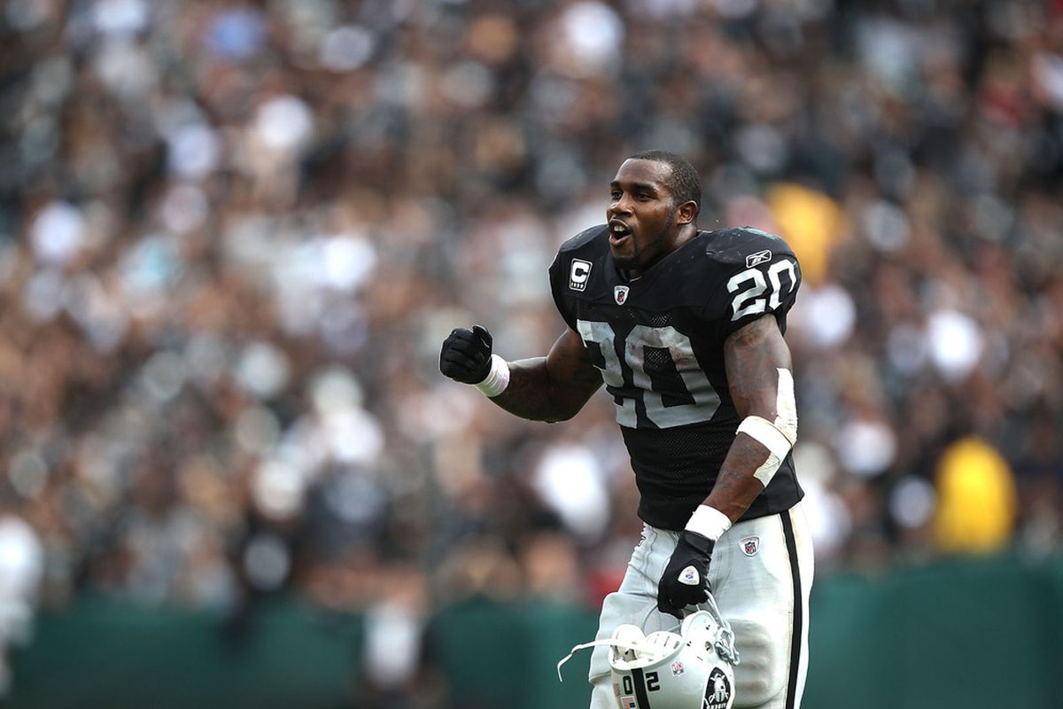 OAKLAND, CA - SEPTEMBER 25:  Darren McFadden #20 of the Oakland Raiders celebrates against the New York Jets at O.co Coliseum on September 25, 2011 in Oakland, California.  (Photo by Jed Jacobsohn/Getty Images)