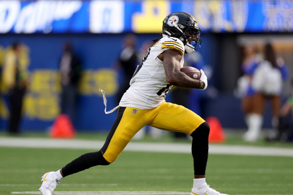 Diontae Johnson #18 of the Pittsburgh Steelers runs after his catch during a 24-17 win over the Los Angeles Rams at SoFi Stadium on October 22, 2023 in Inglewood, California.