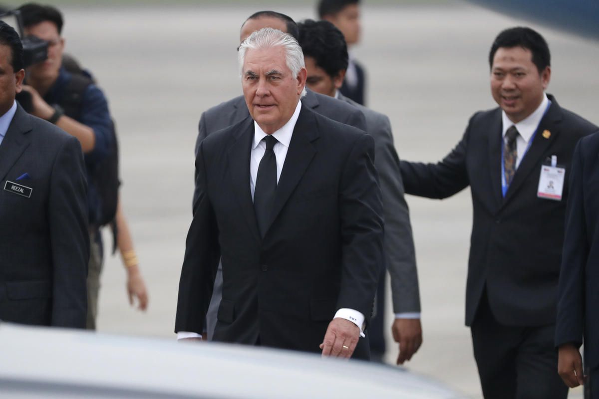 U.S. Secretary of State Rex Tillerson, center, arrives at a military base in Subang, Malaysia, Tuesday, Aug. 8, 2017.